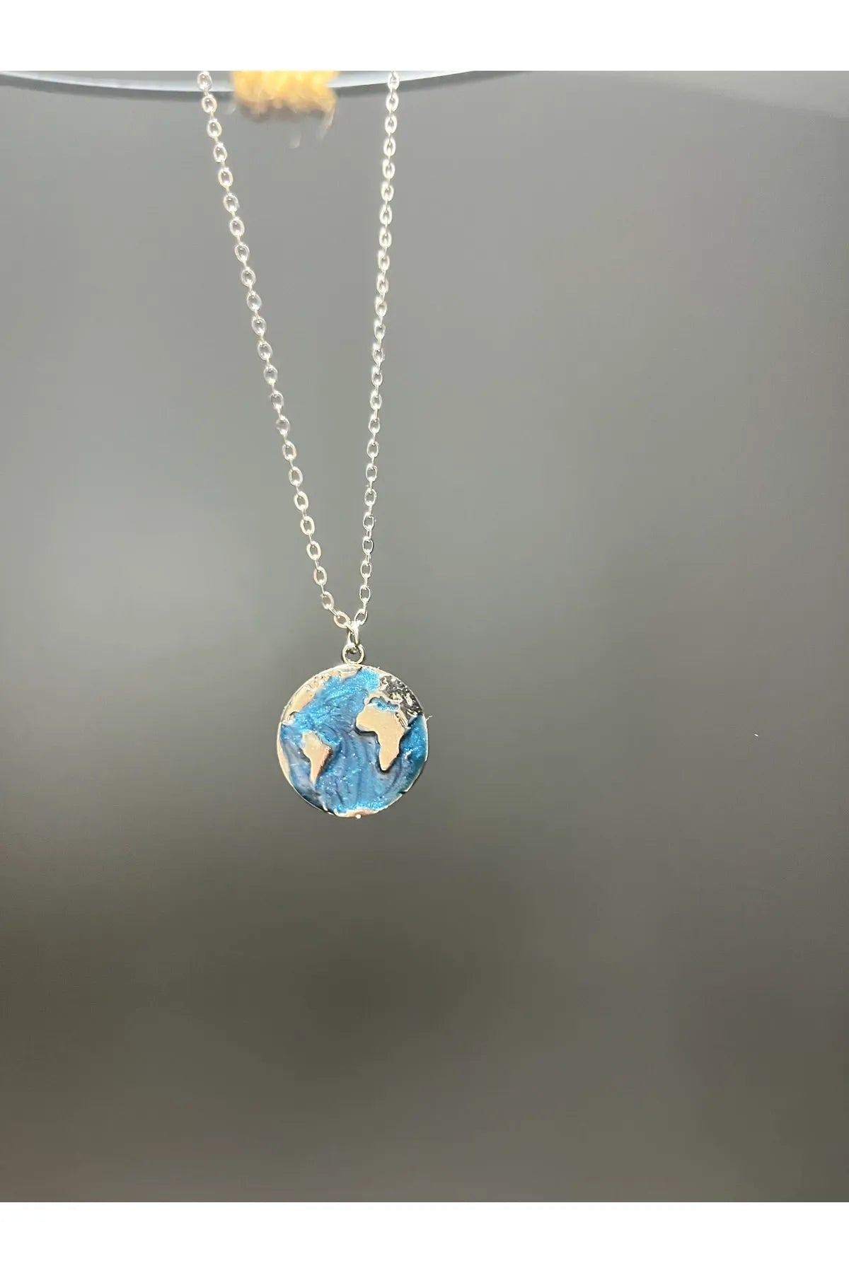 Çelik Dünya Kolye